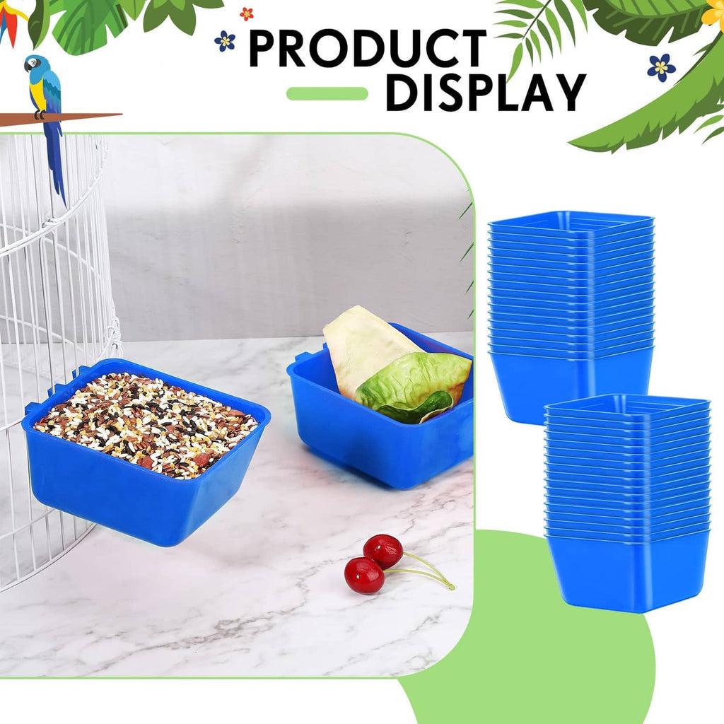 Blue plastic water feeder cups holding bird feed and greens