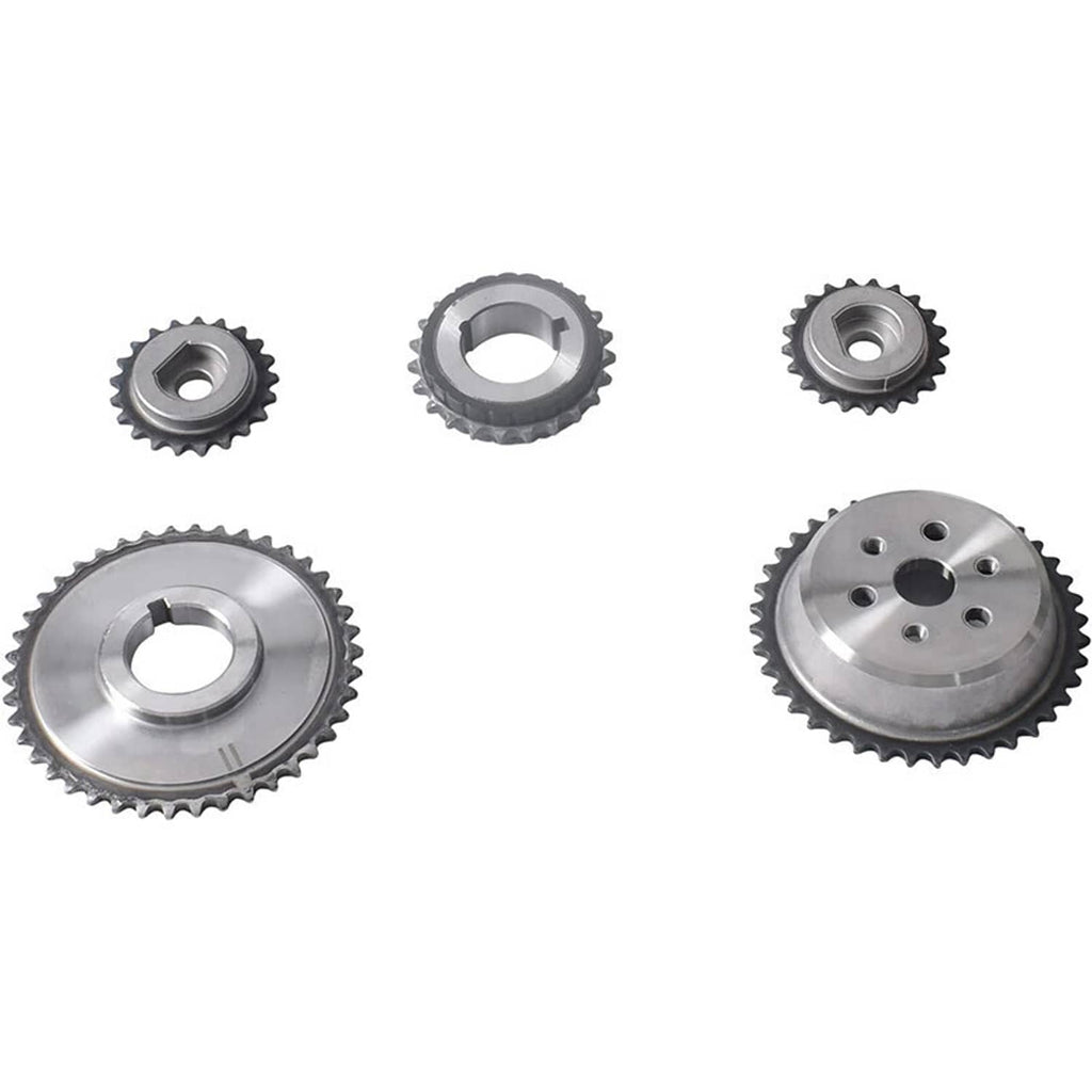 Set of silver timing gears and sprockets with toothed edges and central bores.