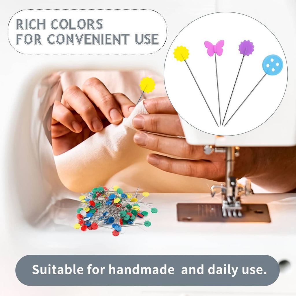 Colorful flat head straight pins with decorative heads shown in hand and on fabric