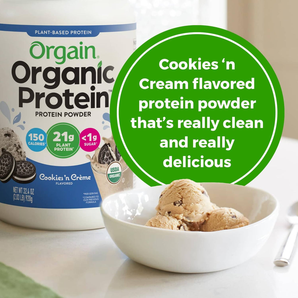 Protein powder tub beside bowl of Cookies 'n Cream dough, flavor badge shown