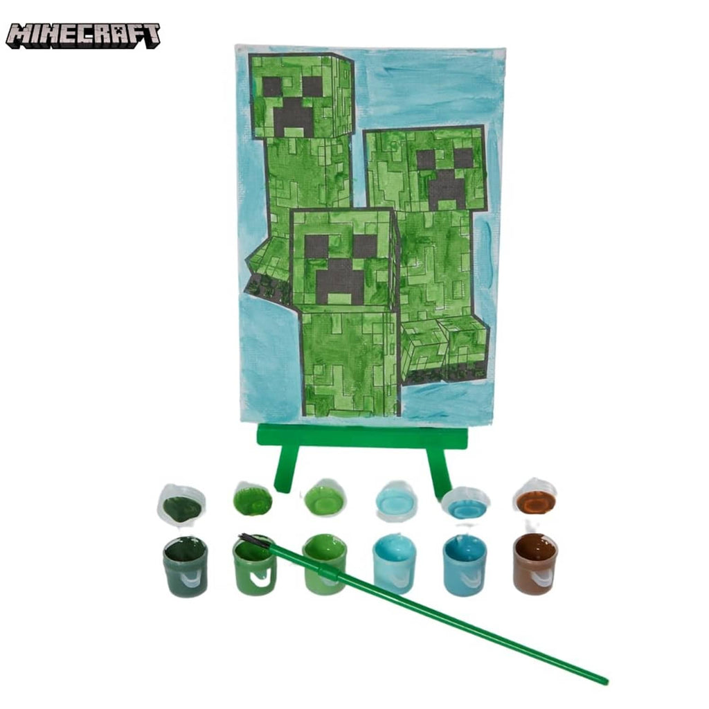 Painted Minecraft canvas on green easel with paint pots and green-handled paintbrush
