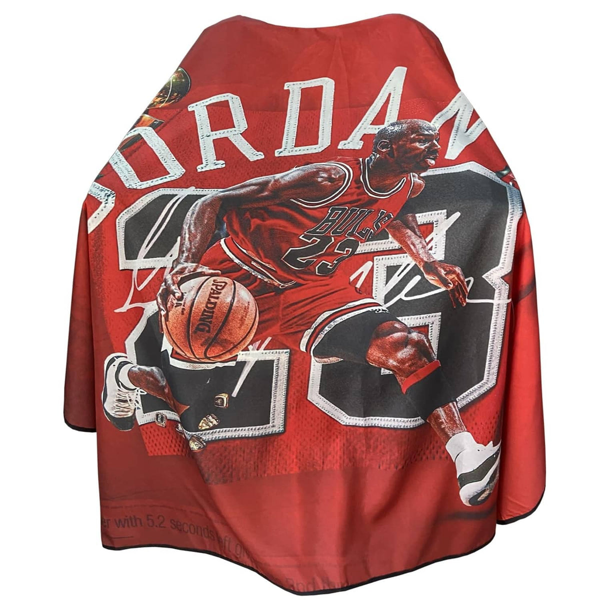 Red barber cape with large sports graphic panel and wide drape