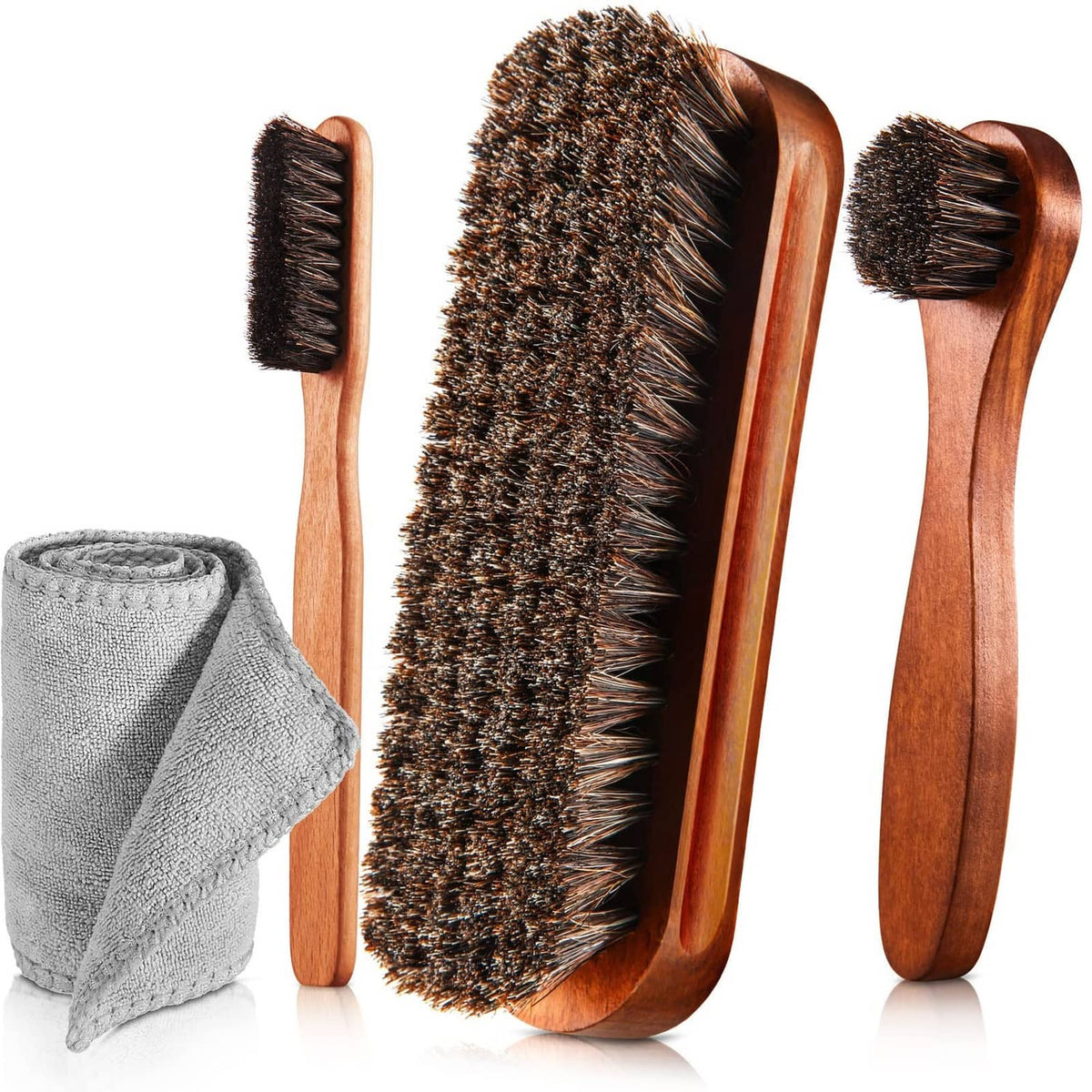 Brown horsehair shoe brush set with wooden handles and small polishing dauber applicators