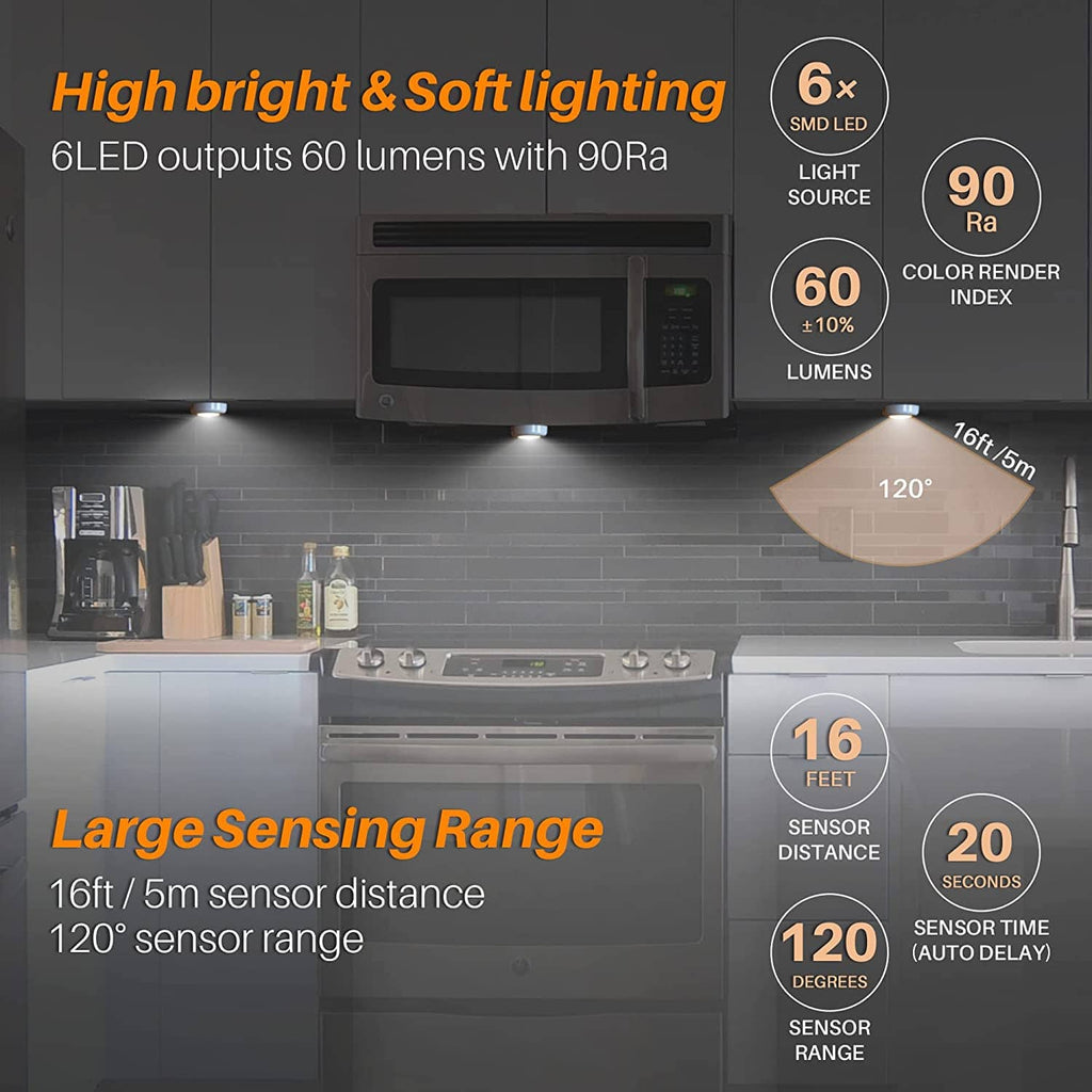 Three white LED motion sensor puck lights shown glowing