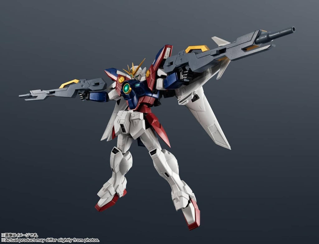 TAMASHII NATIONS Gundam action figure flying pose with twin cannons and wing panels
