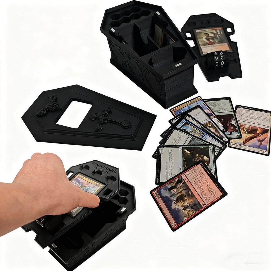 Black coffin-style deck box open with card tray and dice compartment, plus card set