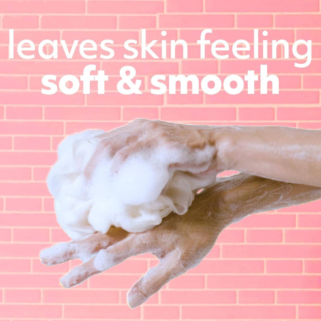 Softsoap coconut butter scrub on hands, smooth foaming gel lather