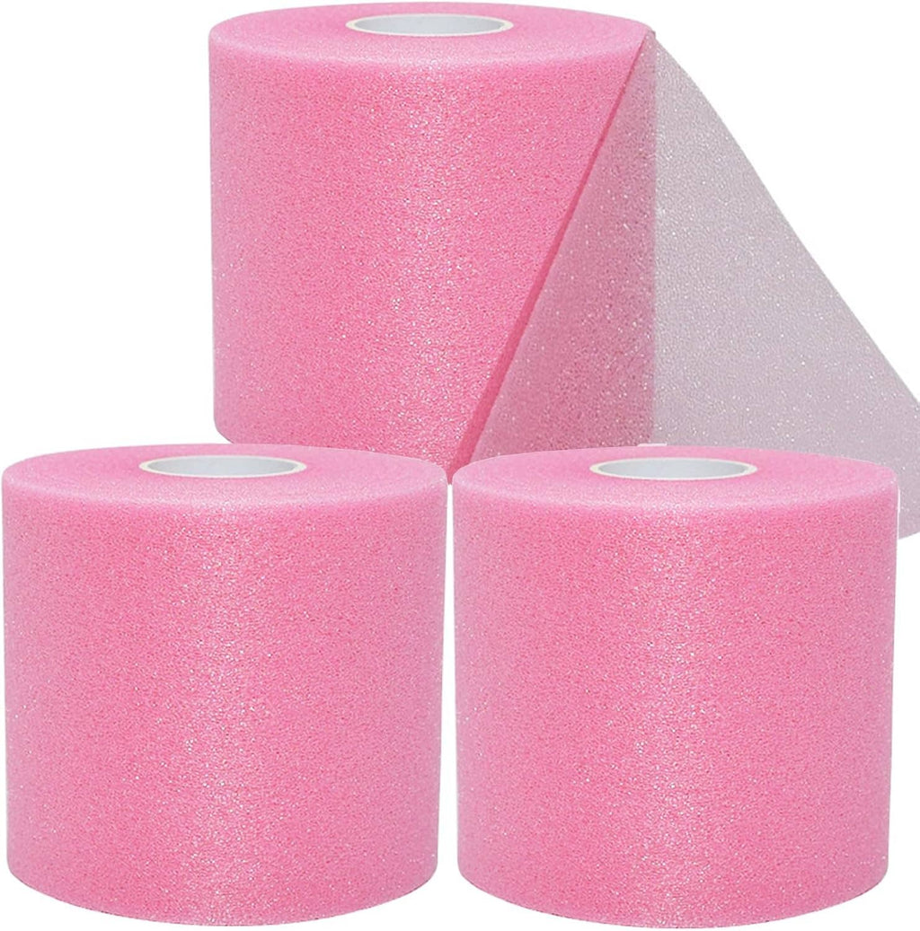 Three pink foam pre-wrap tape rolls with center core holes