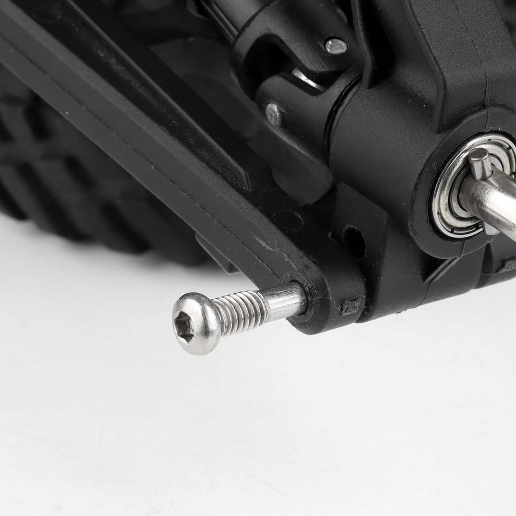 Close-up: silver threaded pin screw next to black suspension joint