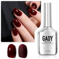 Dark red UV gel polish for nails, glossy manicure on fingers; GAOY bottle included.