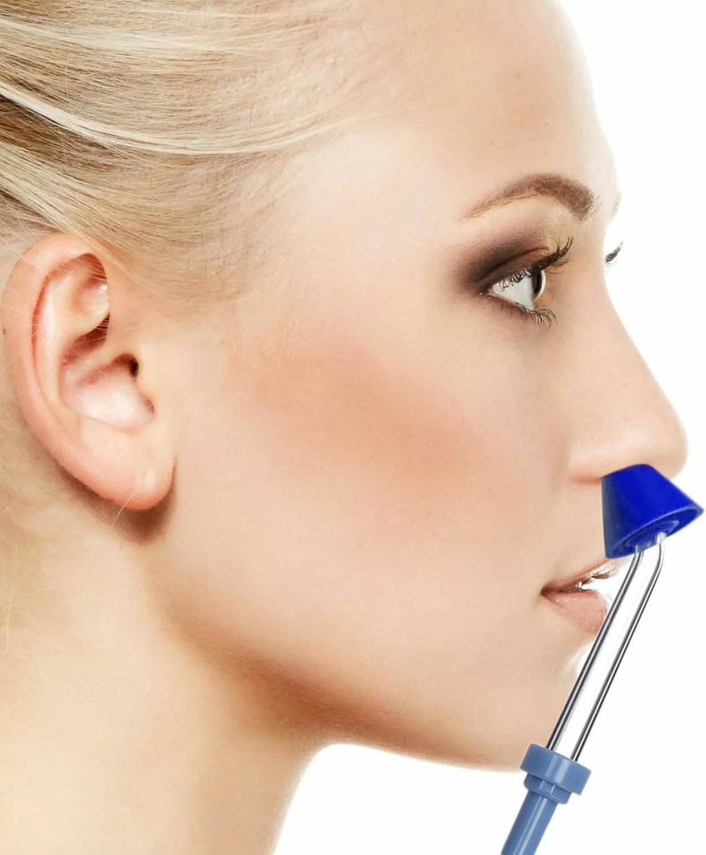 Blue nasal rinse tip on metal nozzle positioned near nose