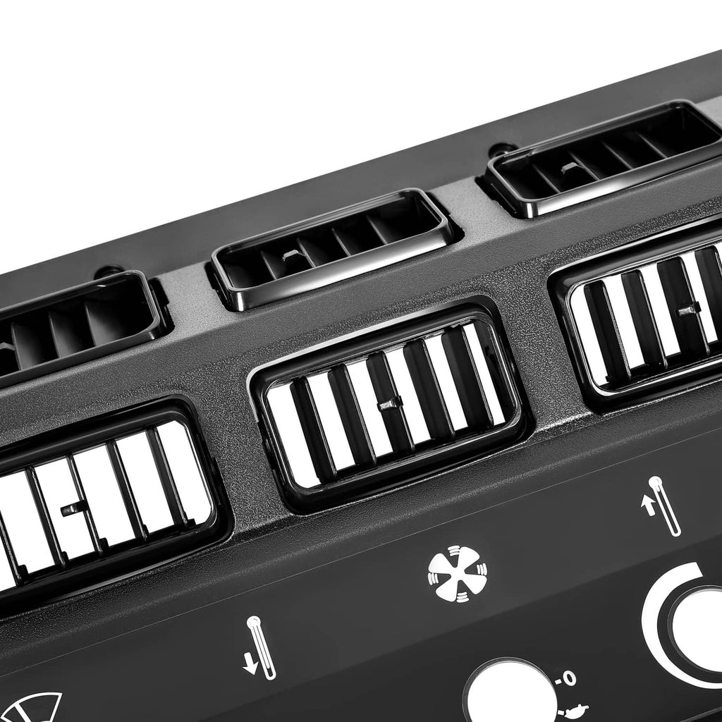 A/C heat control panel bezel close-up showing multiple vent grilles and control icons