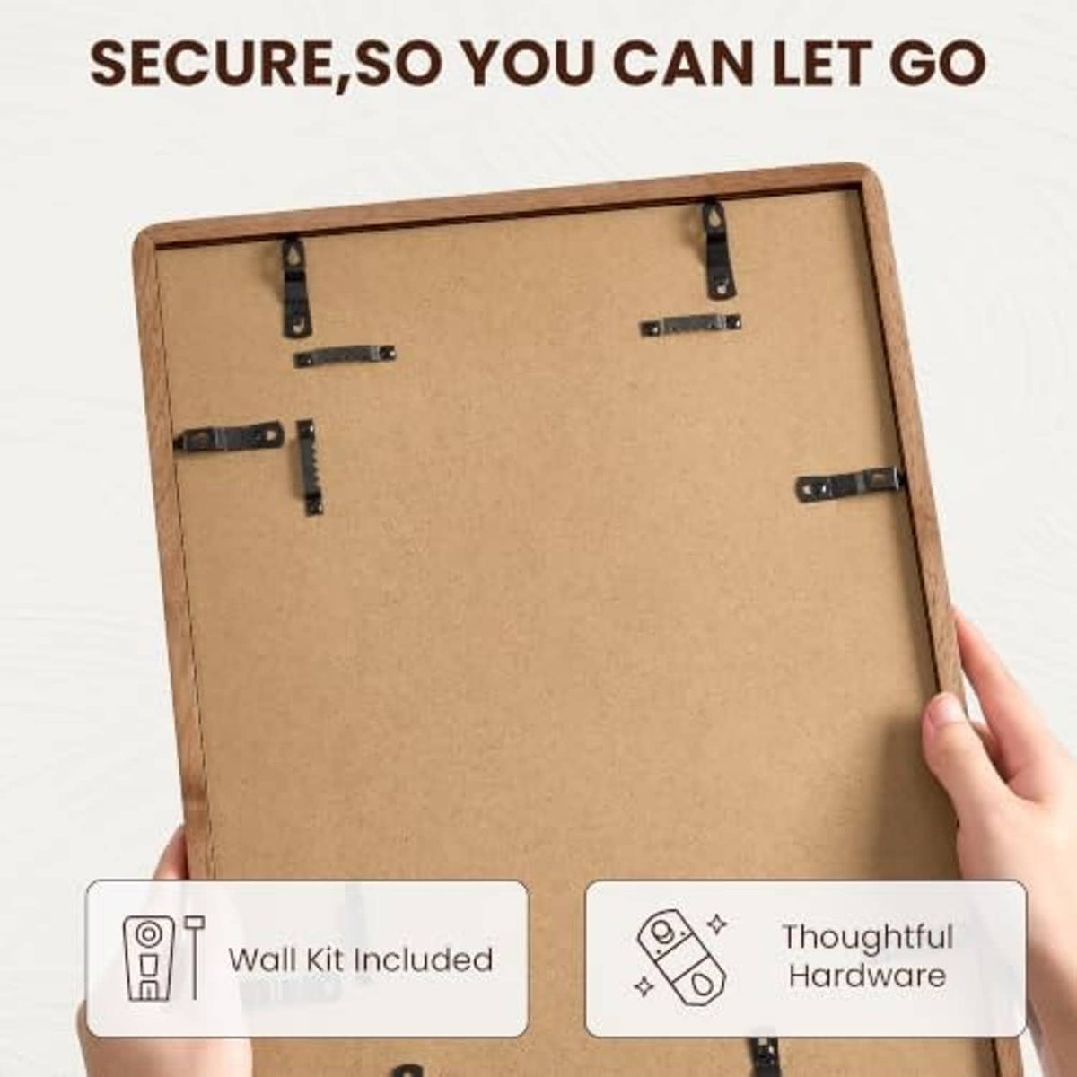 Back of walnut-tone picture frame with hanging hardware and included wall kit