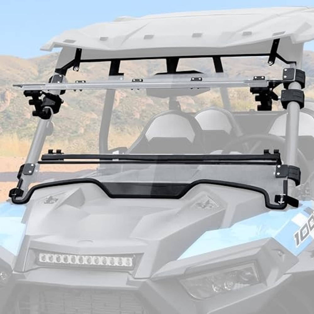 Flip-up windshield installed on UTV with clear panel, black frame, and side mounting points