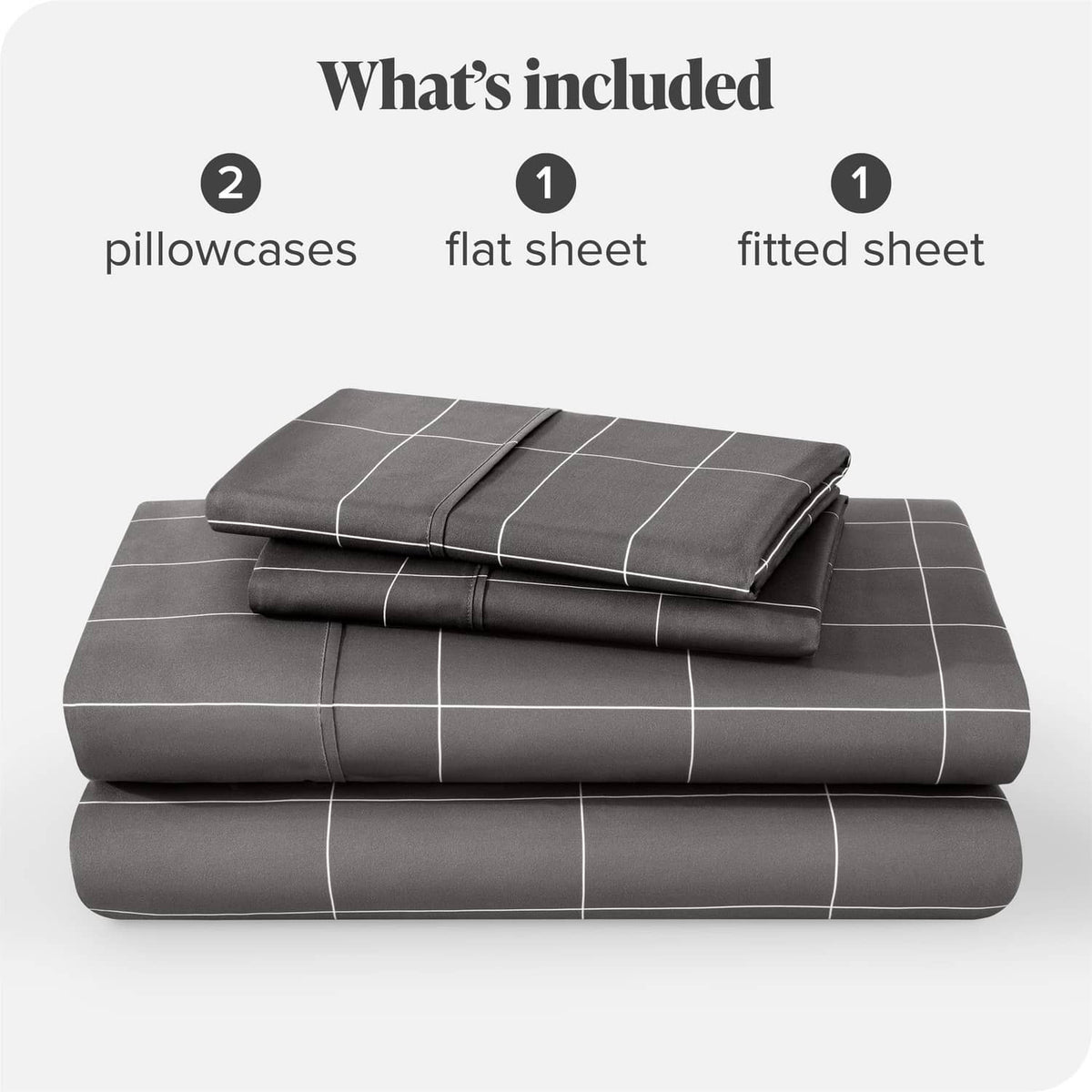 Bed sheet set bundle in grey with white grid pattern, folded with fitted and flat sheets