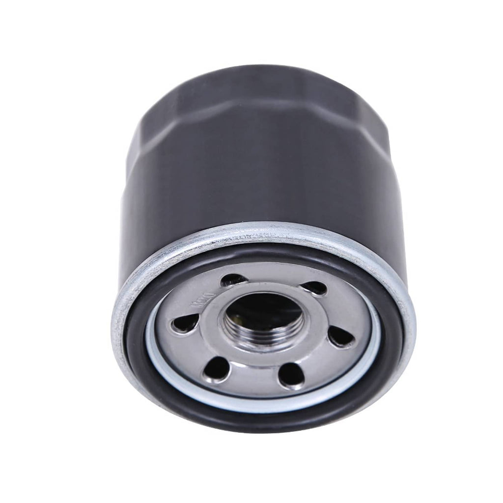 Oil filter cartridge face view with circular ports and threaded inlet, dark housing