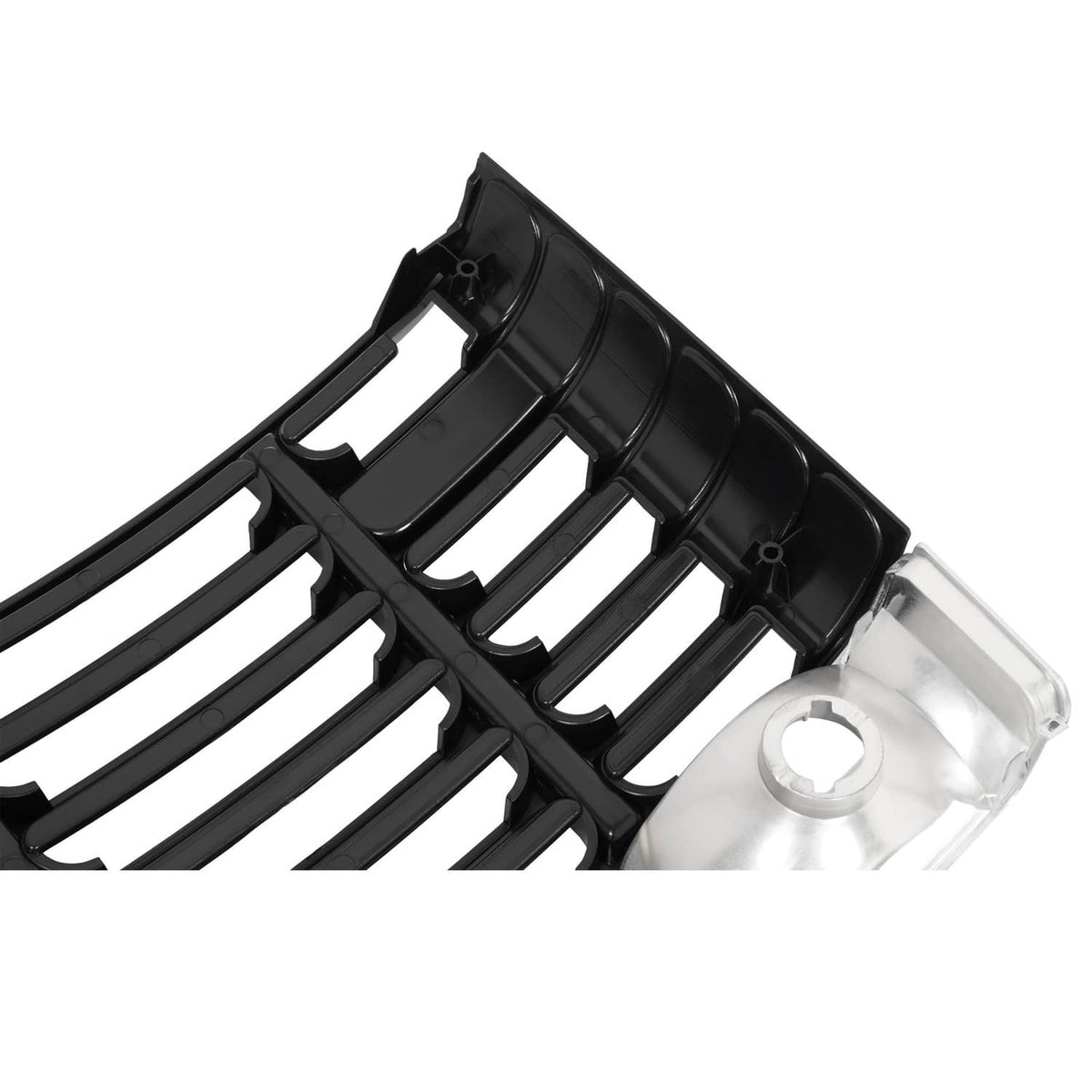 Black ABS grille corner close-up with slat pattern and silver-toned trim housing