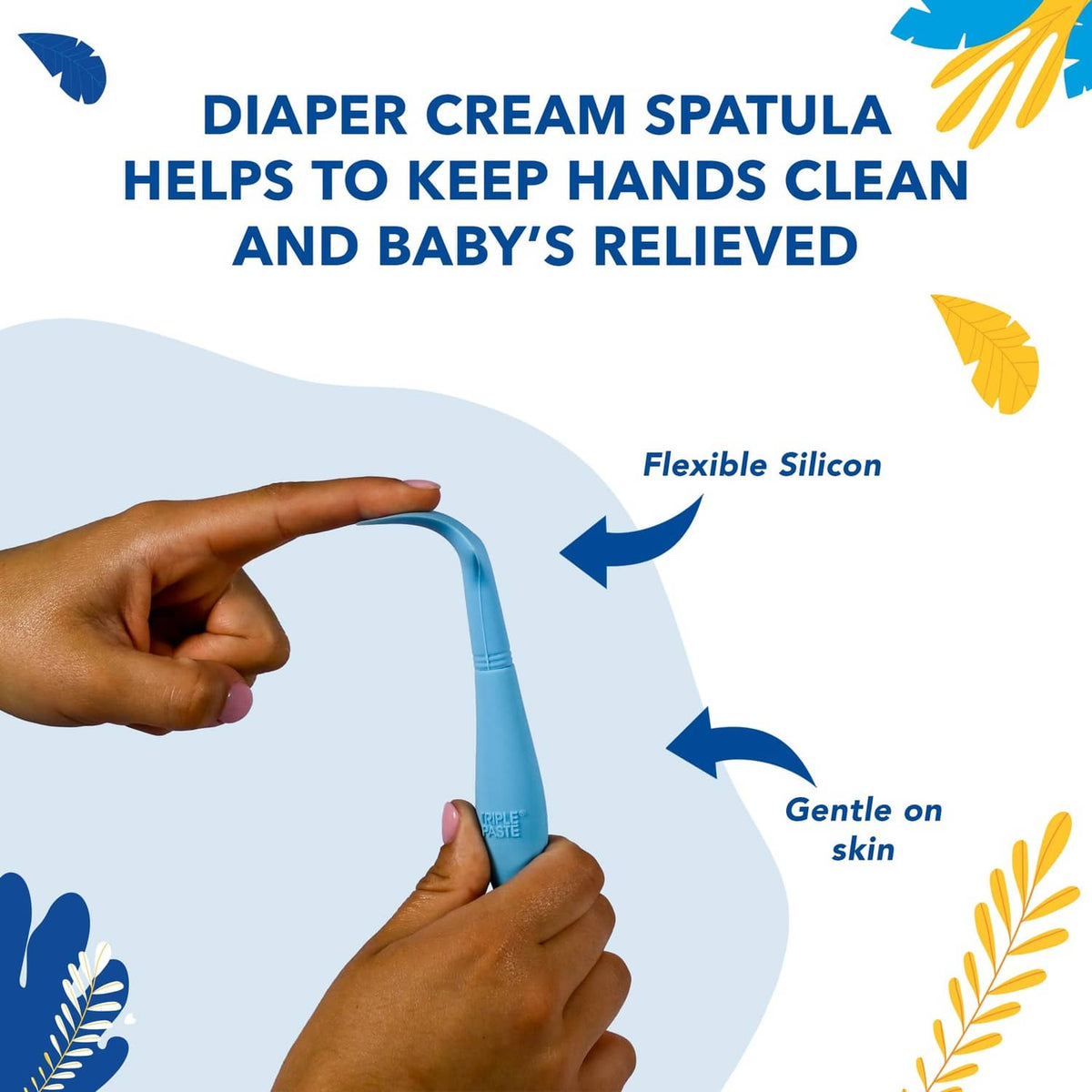 Blue silicone diaper cream spatula held by hands