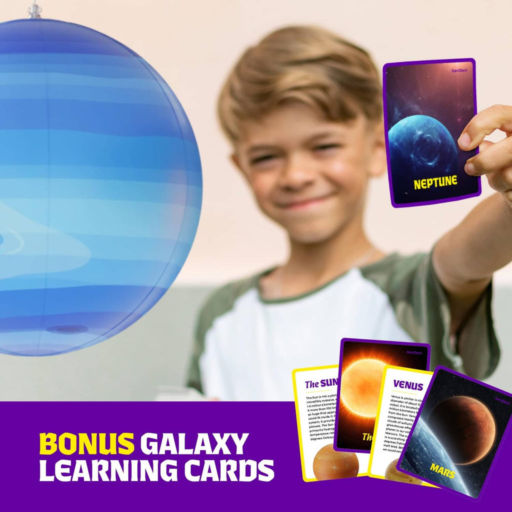 Inflatable blue planet balloon with children holding space-themed cards nearby