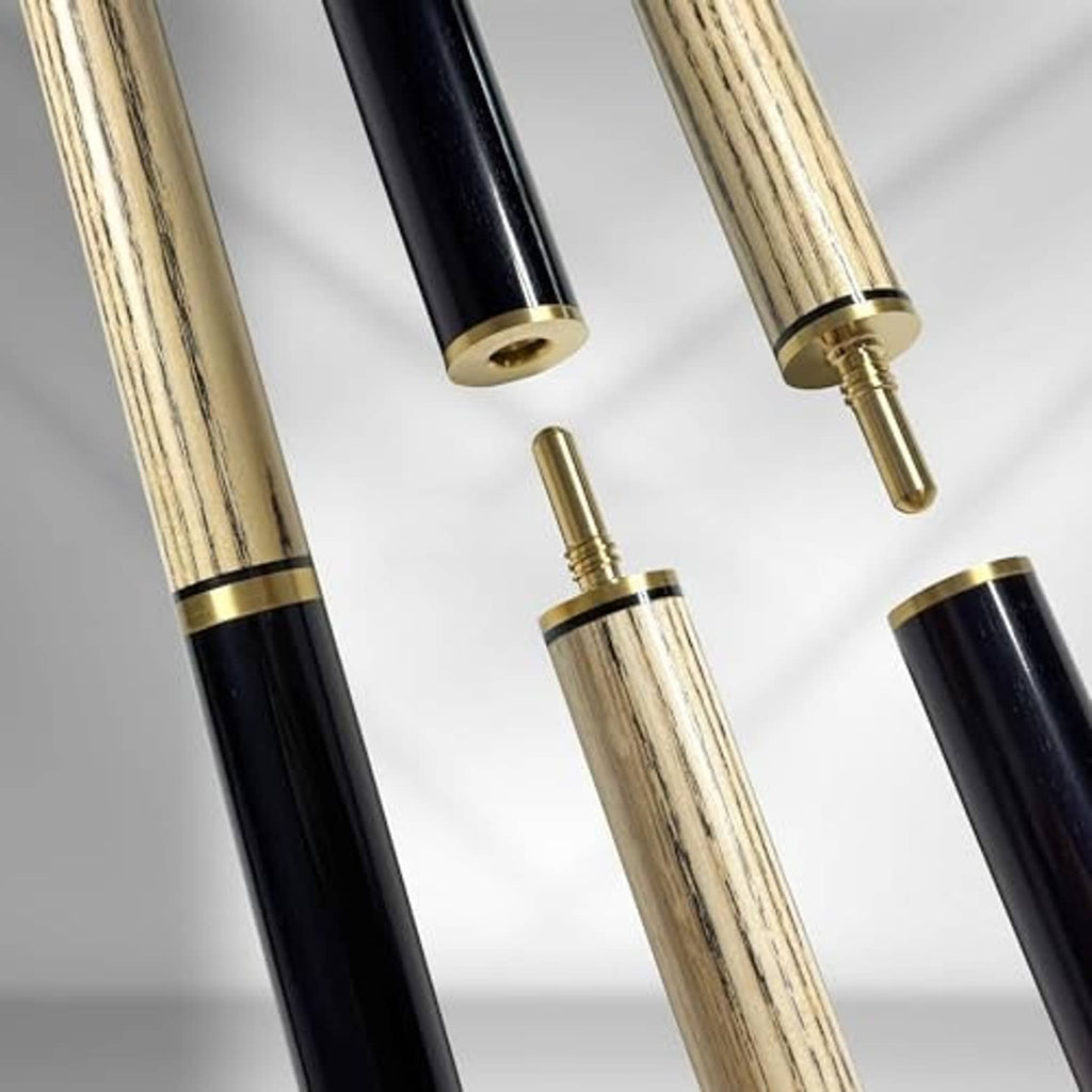 Billiard cue shafts with gold joints and dark end tips