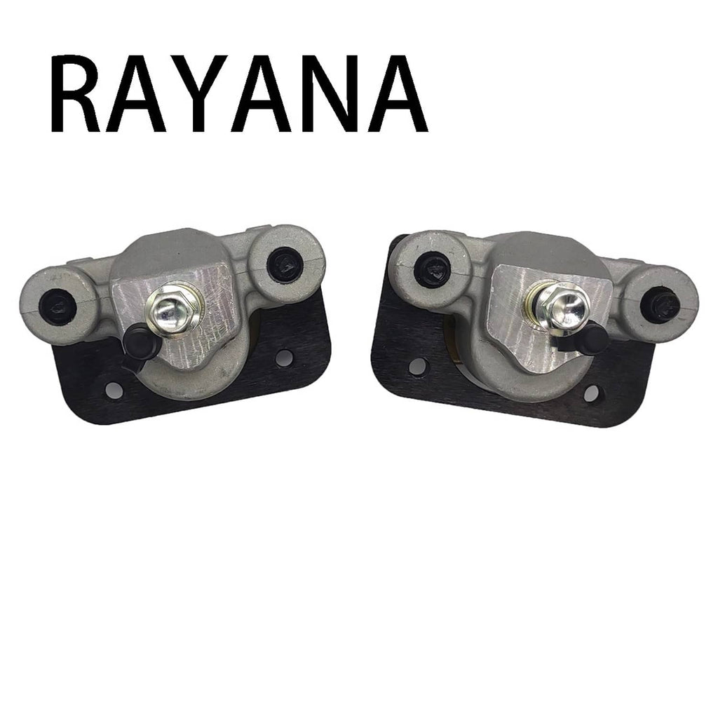 Front brake caliper pair with exposed metal piston, gray body, and black mounting plates.