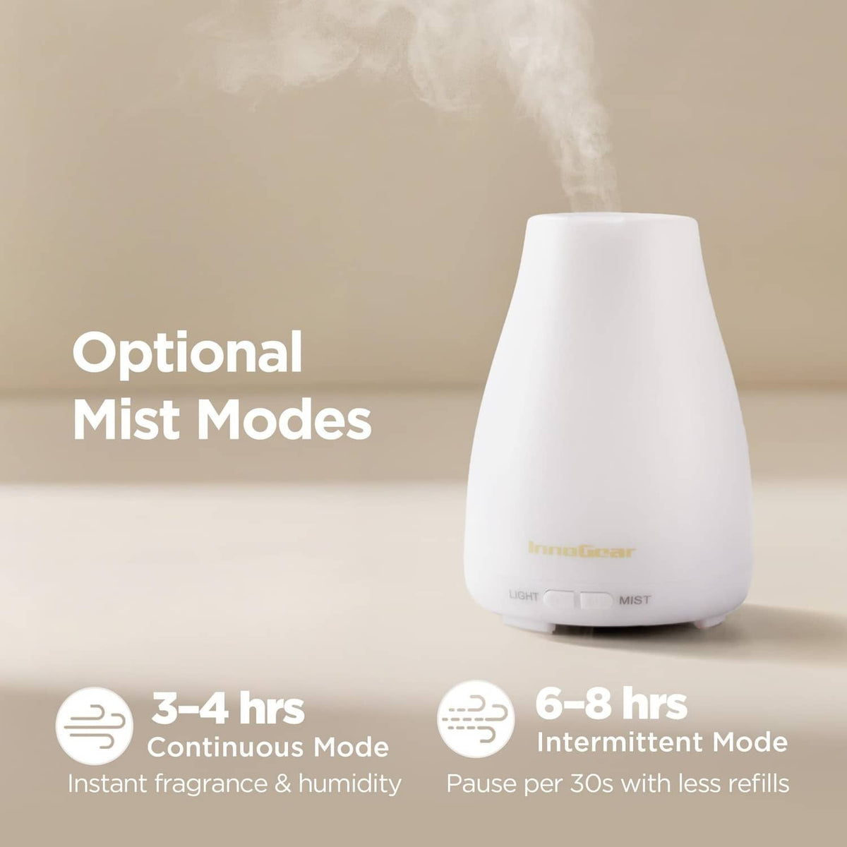 White essential oil diffuser showing optional mist modes, with visible mist