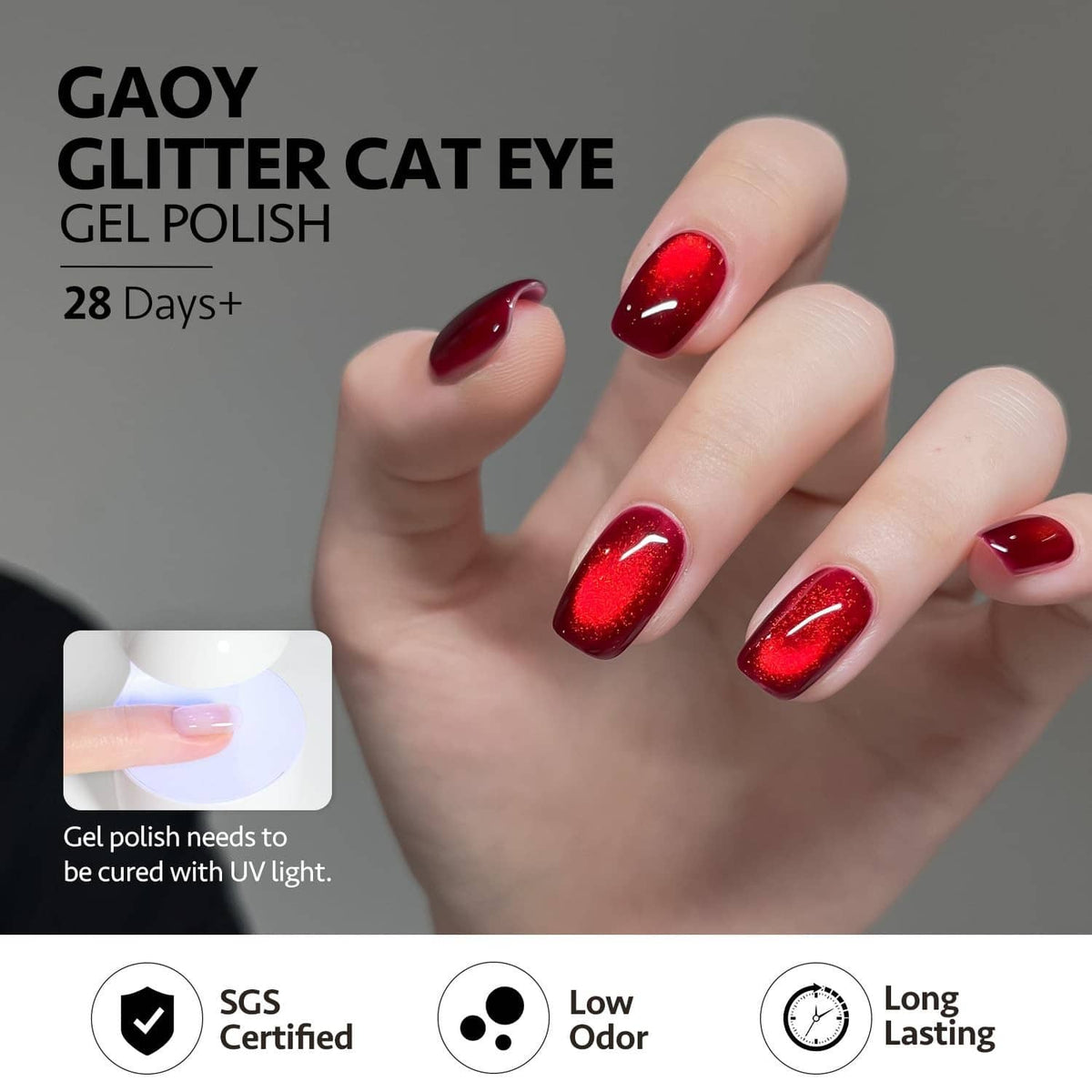 Red cat-eye gel nail polish on long almond nails, glossy metallic ruby shimmer.