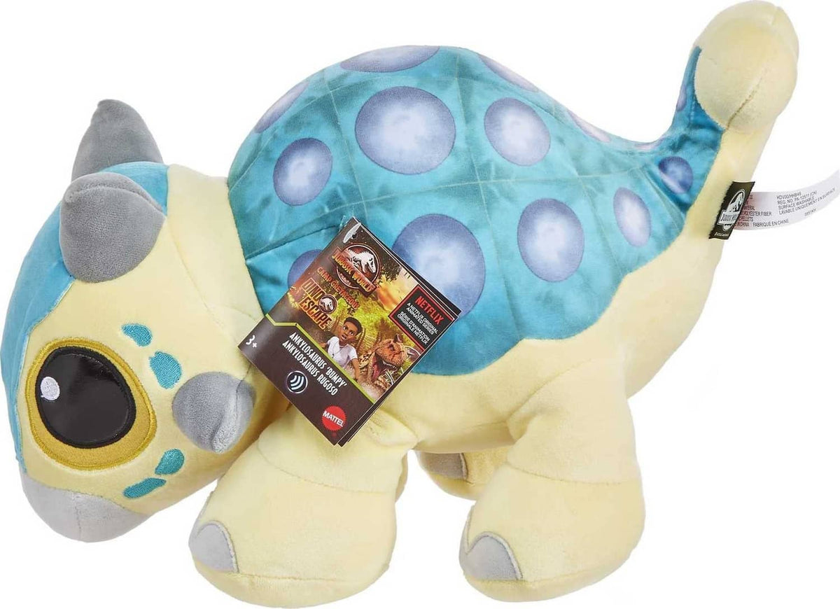 Blue plush baby dinosaur with purple spots, big black eyes, and hanging tag on back