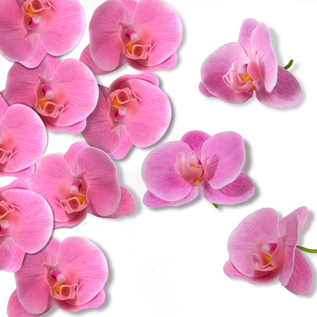 Pink artificial orchid flower heads, multiple layered petals with yellow centers