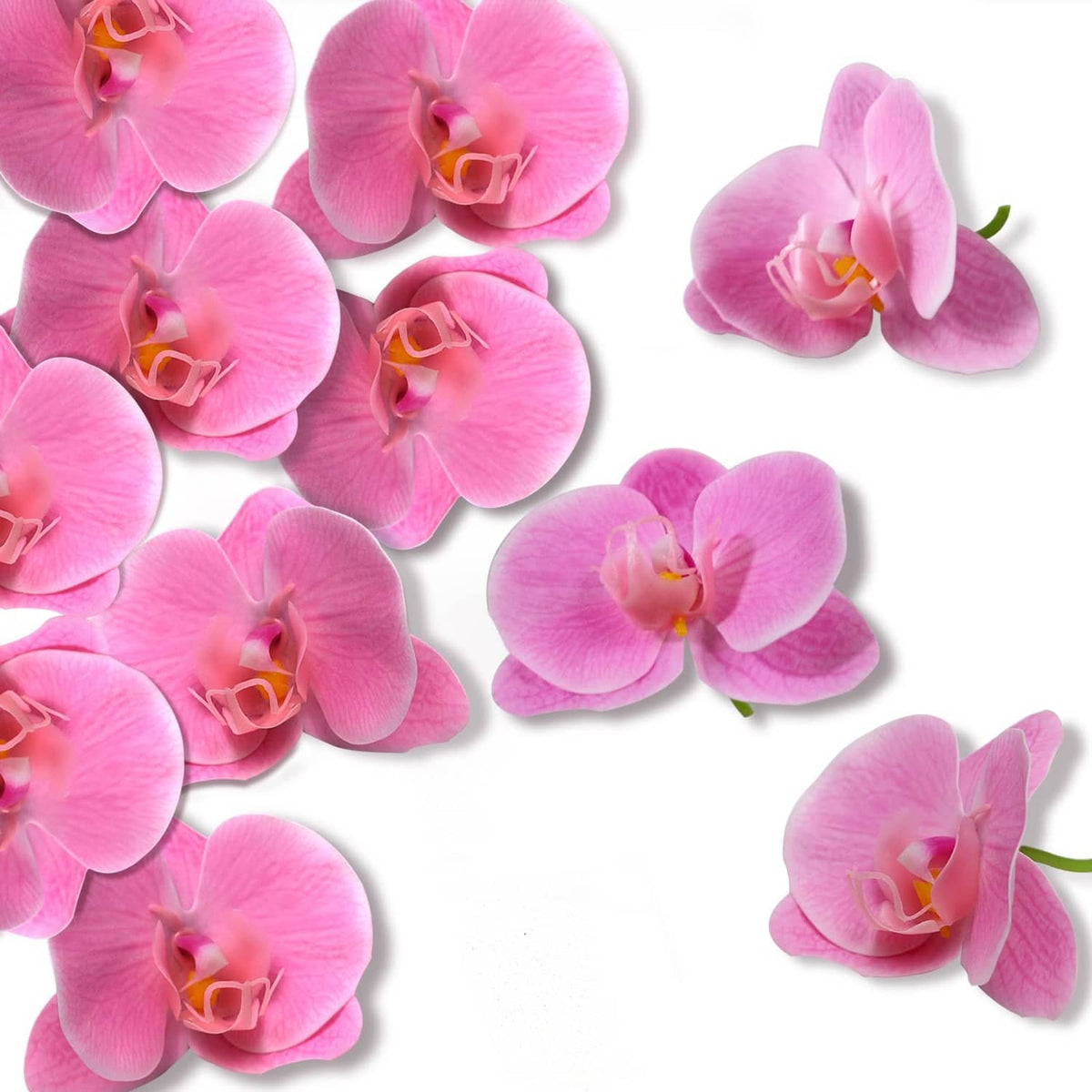 Pink artificial orchid flower heads, multiple layered petals with yellow centers