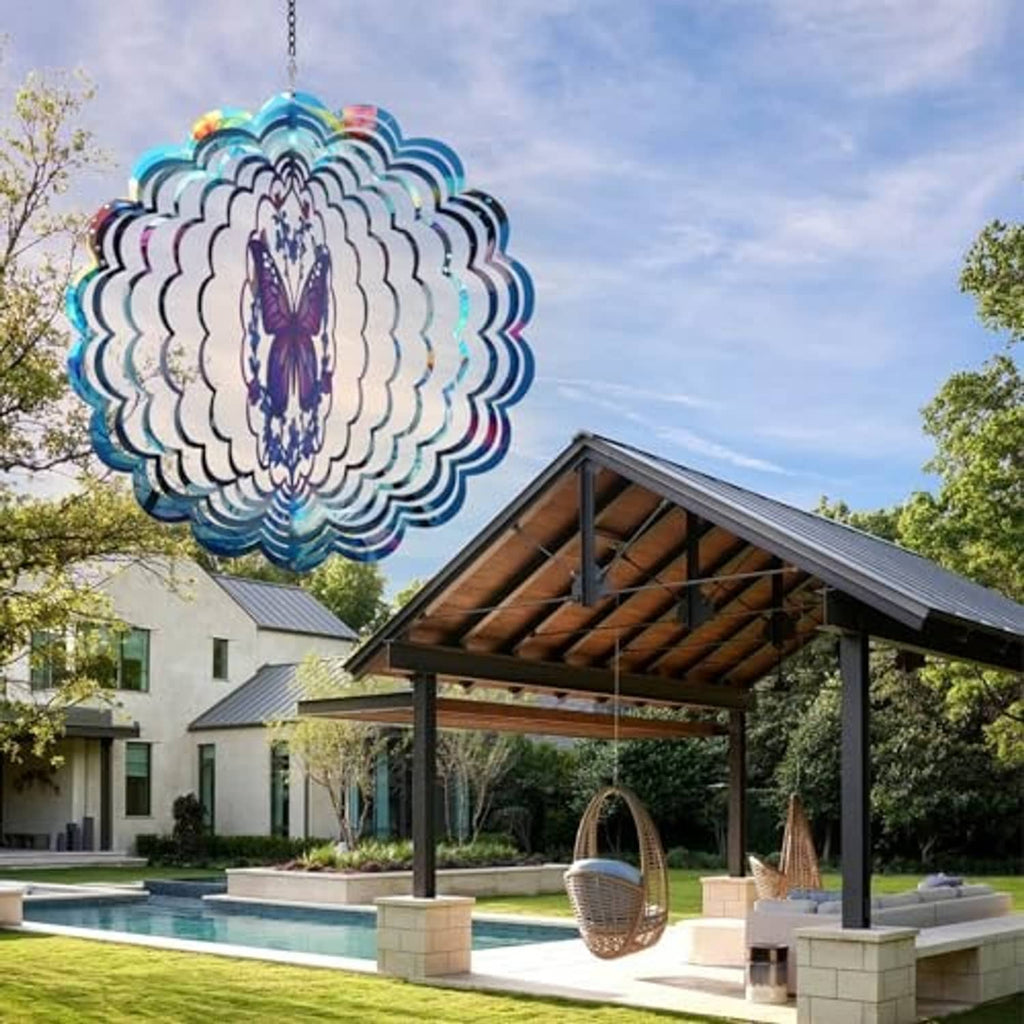 Outdoor butterfly wind spinner hanging from a chain with iridescent metal blades