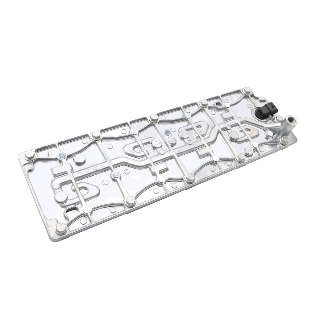 Valve cover with molded internal channels and a dark sensor connector on top