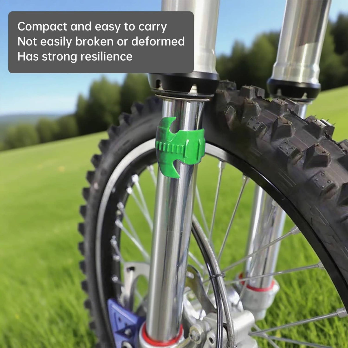 Motorcycle fork seal cleaner tool clipped on front fork near the wheel