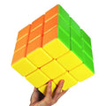 Stickerless 3x3 speed cube with orange, green, and yellow faces.