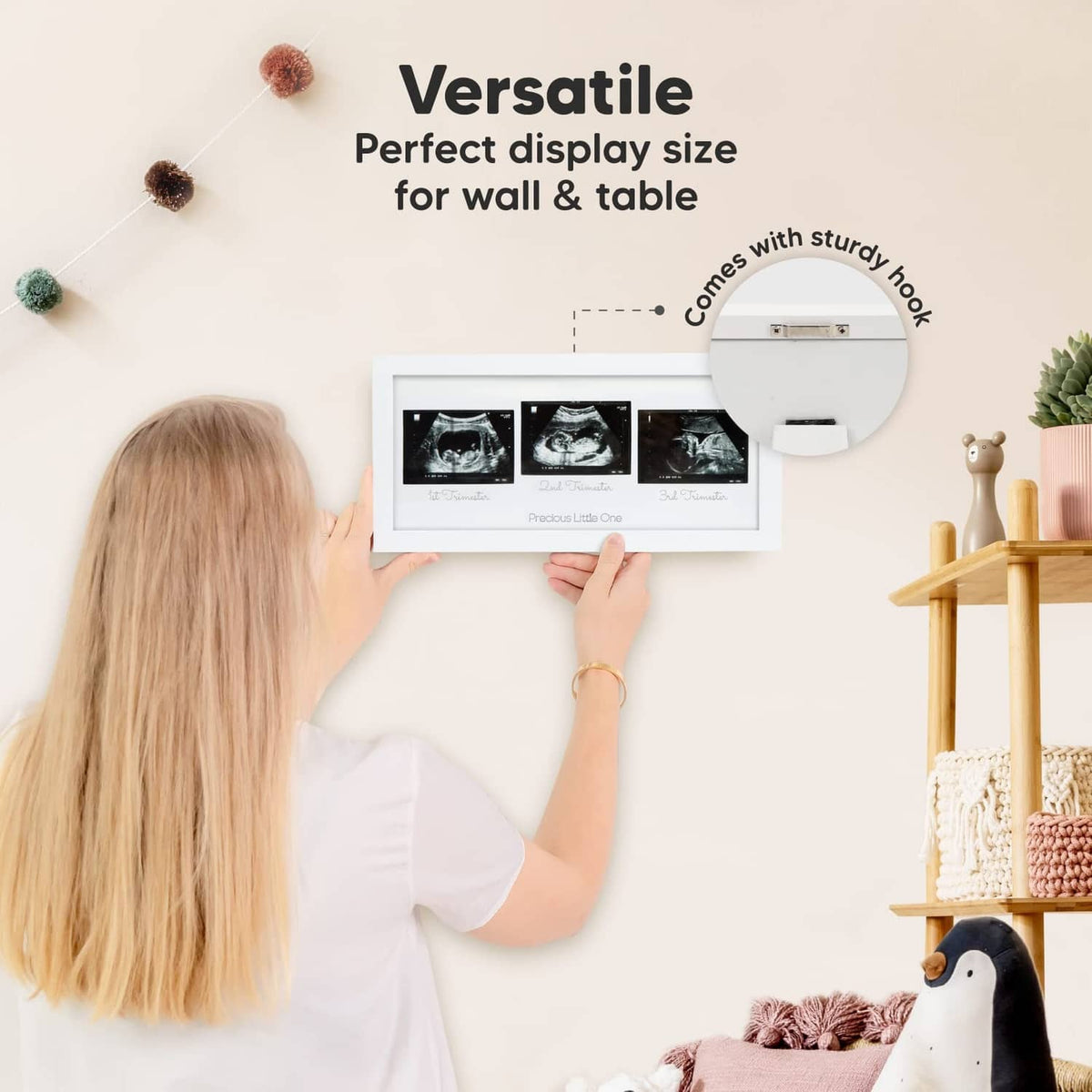 White ultrasound trio frame with sturdy wall-mount hook showing three sonogram photos