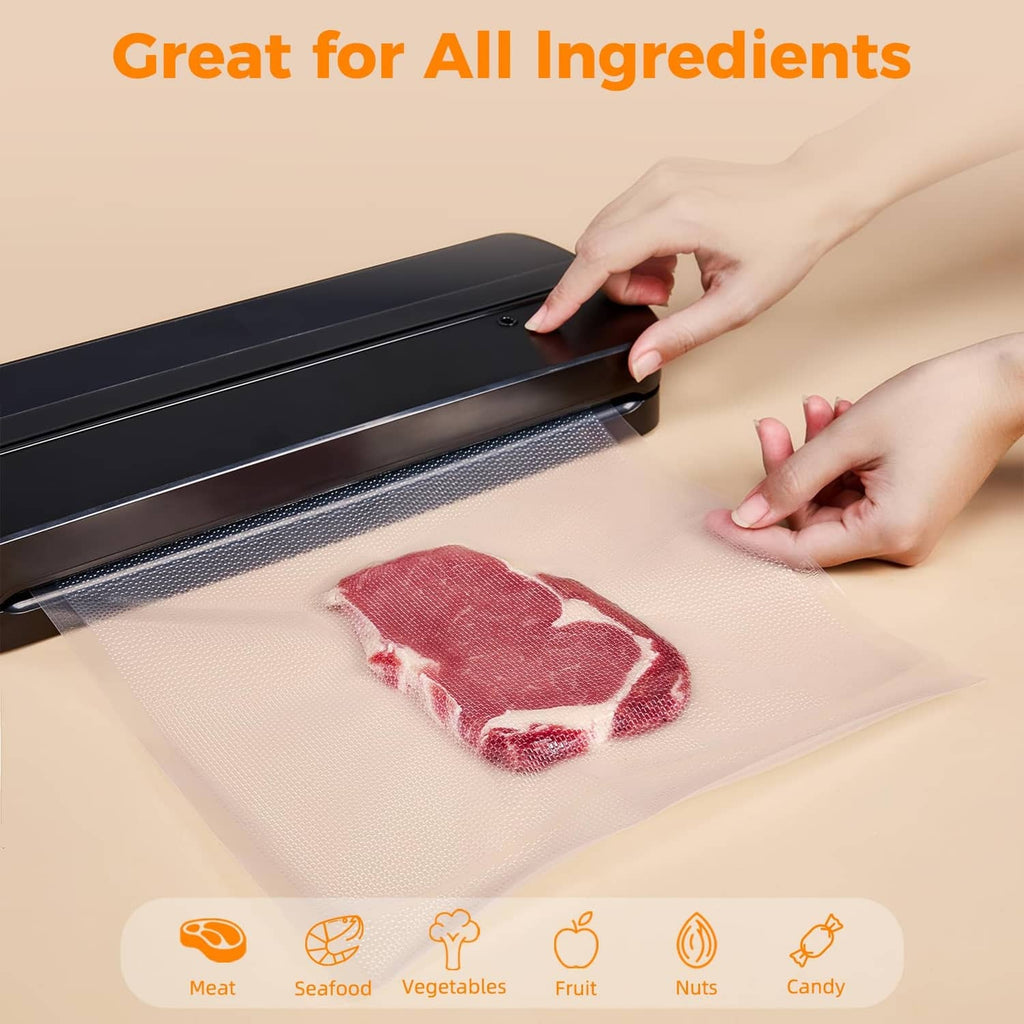 Clear vacuum sealer bag with sealed meat portion as hands close the pouch