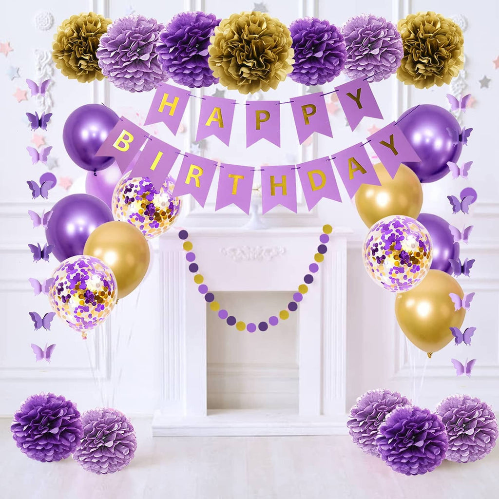 Purple Happy Birthday banner with balloon garland, butterfly decals, and tissue paper pom-poms
