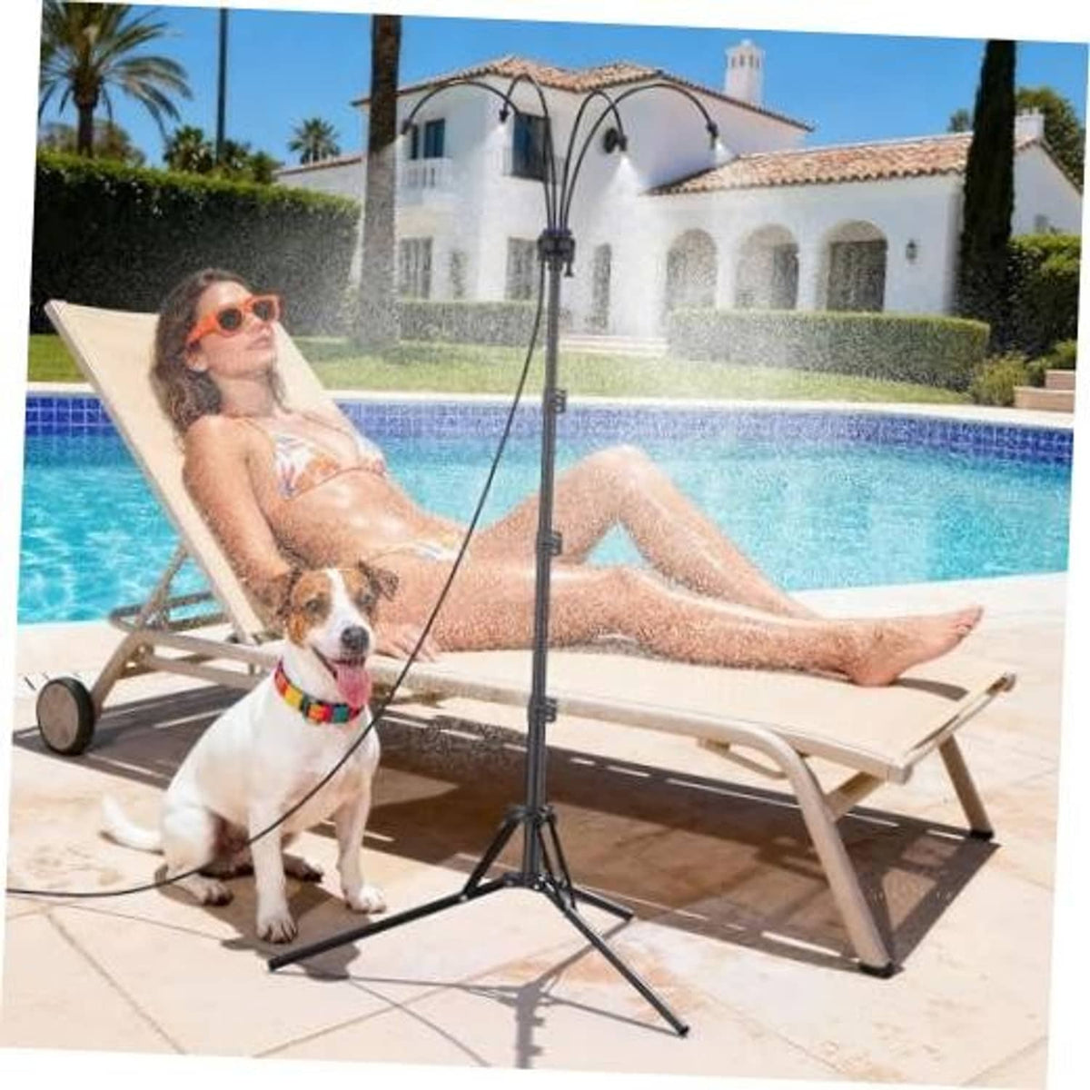 Adjustable outdoor misting stand with tripod base, hose lines, and twin spray heads
