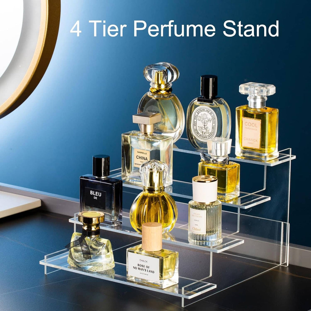 Clear 4-tier acrylic perfume display stand with bottles on three tier shelves