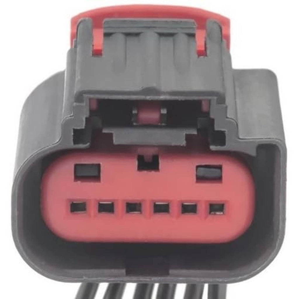 Throttle body actuator connector pigtail close-up with pink cavity and black terminal blocks