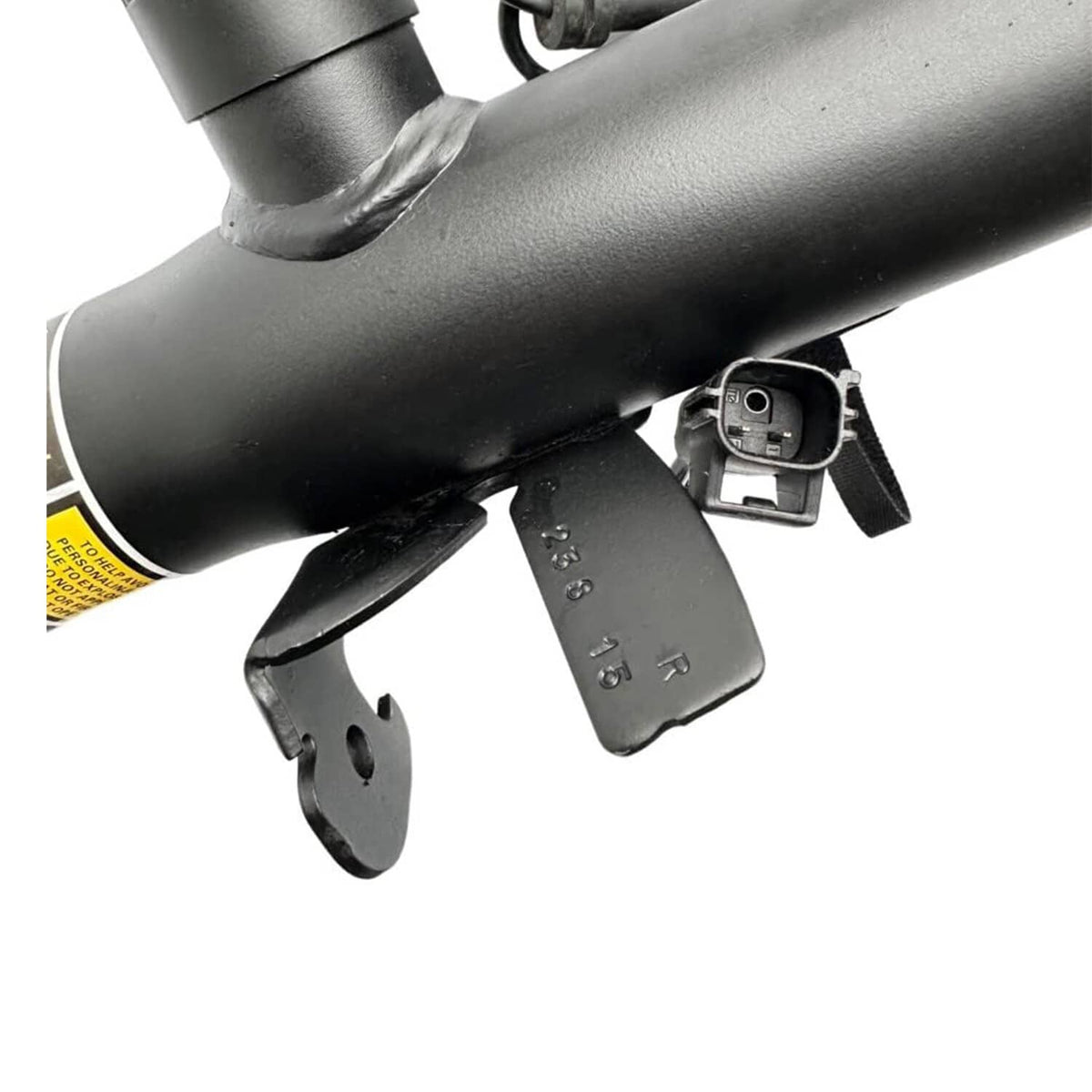 Front shock strut assembly with mounting bracket and attached wiring harness