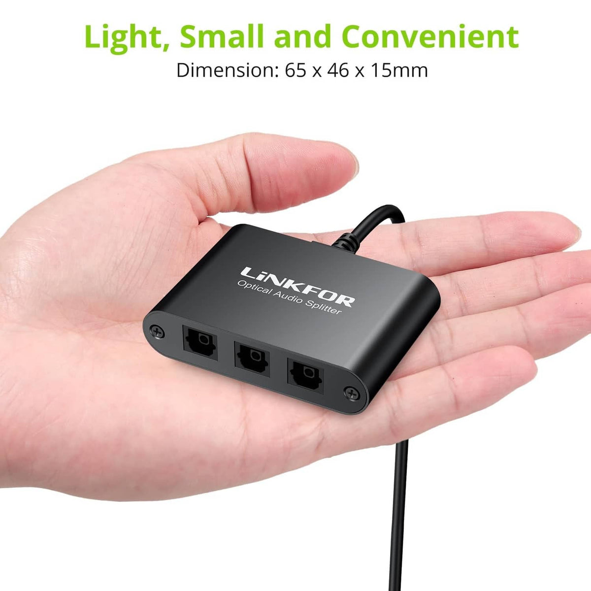 Compact black optical audio splitter shown in hands, with three Toslink ports