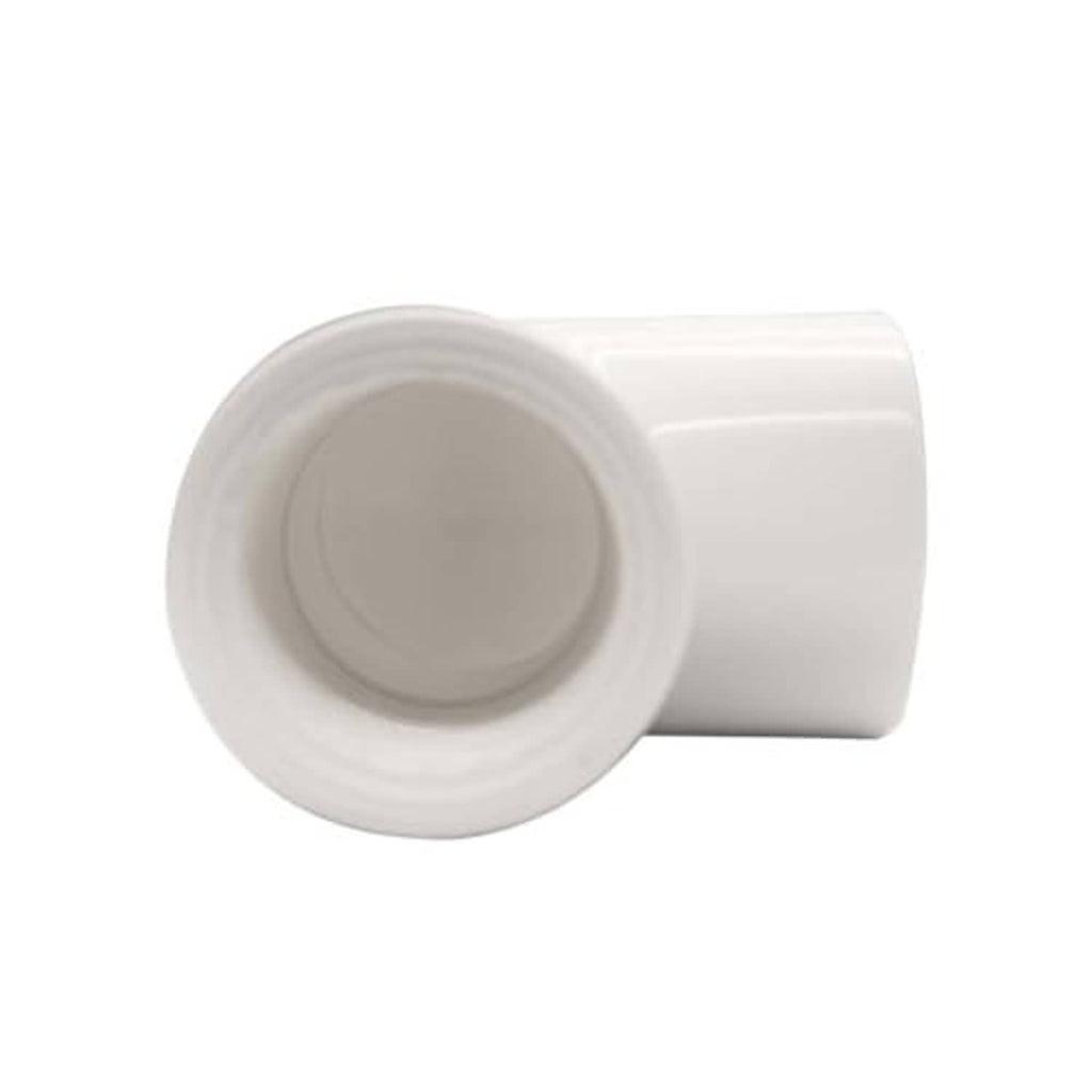 Close-up end view of white PVC 90° elbow fitting with female thread and slip socket