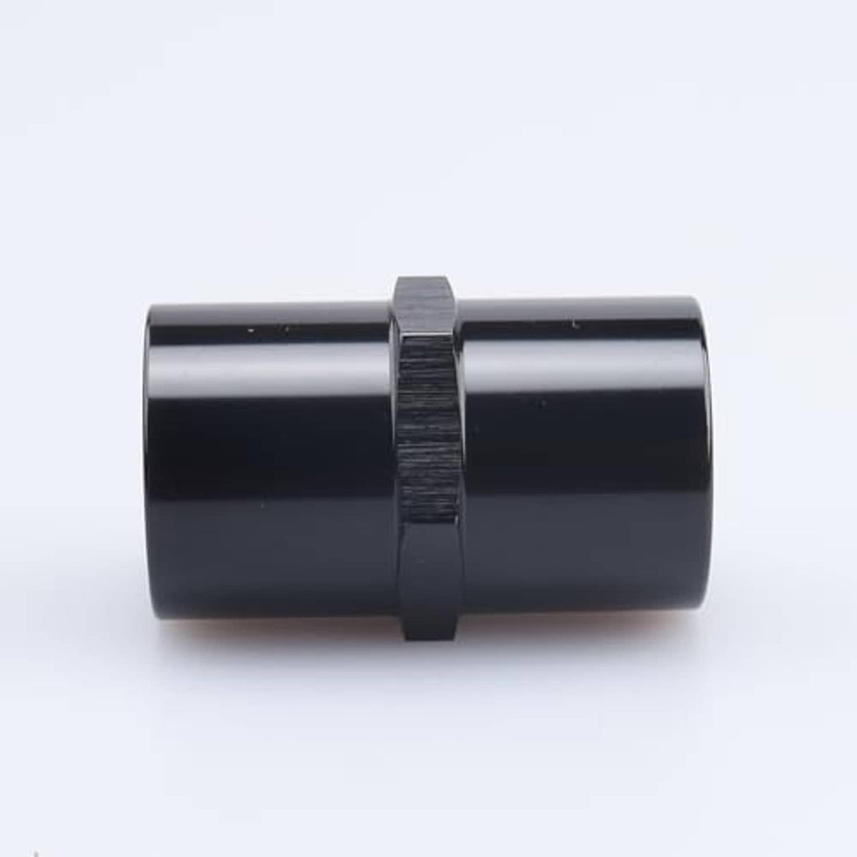 Black aluminum 1/4 in NPT female piping coupler, side profile view