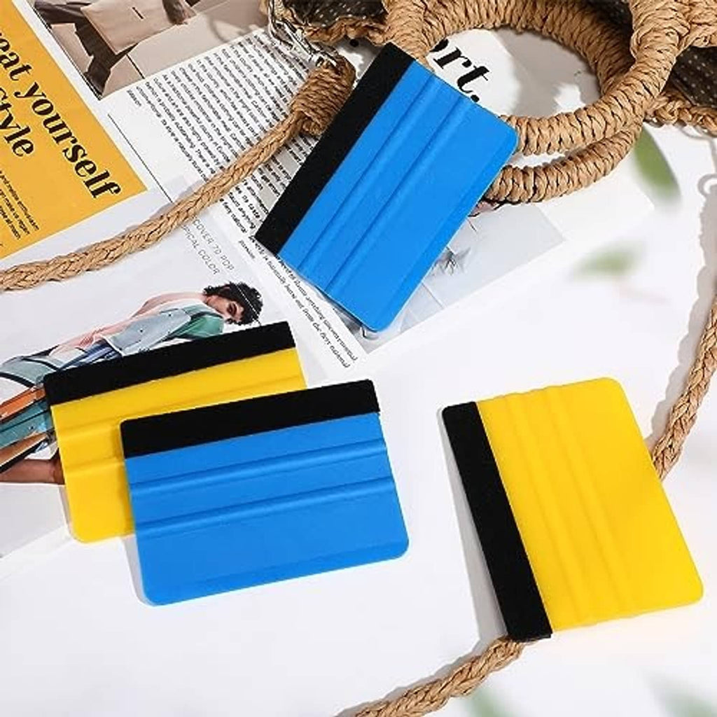 Blue and yellow vinyl squeegees with black felt edges, set of two shown