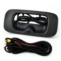 Black tailgate handle backup camera with coiled wiring harness and mounting base