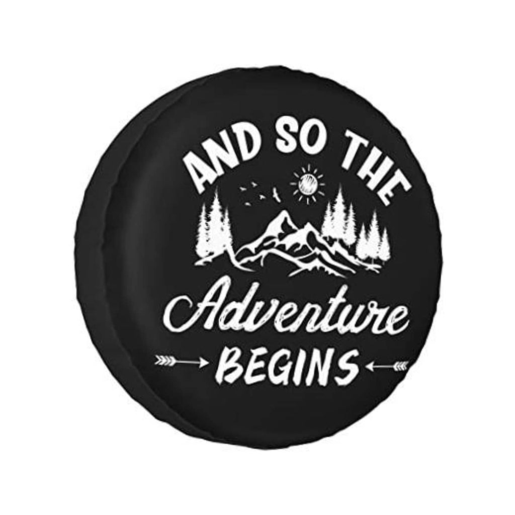 Black spare tire cover with mountain “Adventure Begins” graphic