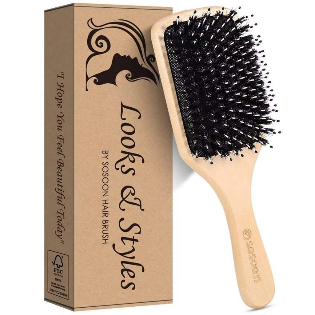 Wooden paddle hairbrush with black boar bristles and matching cardboard box