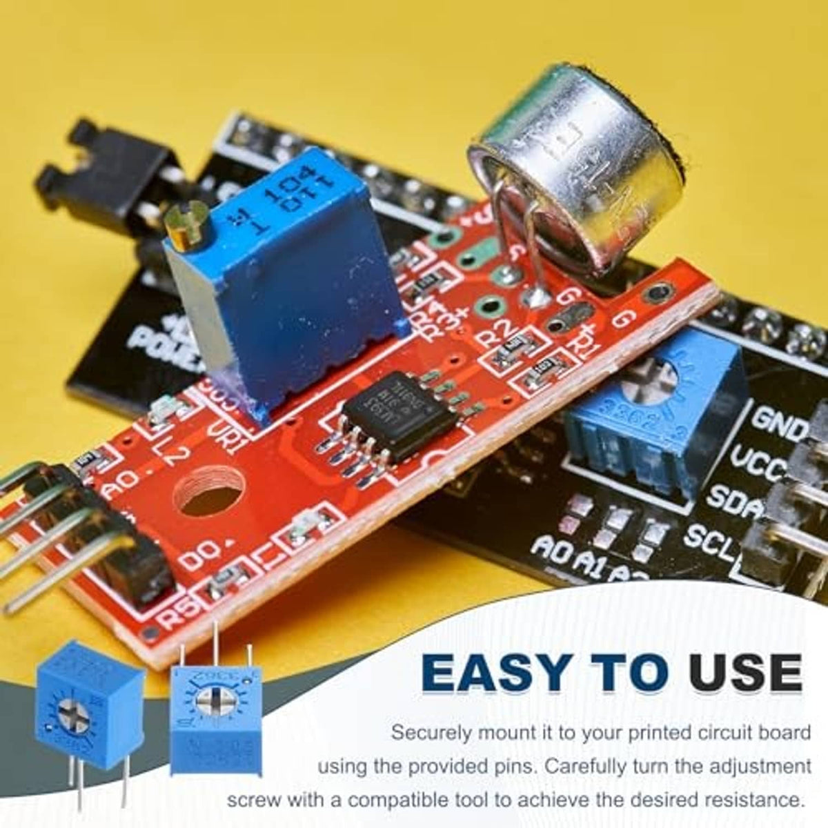 Trimmer potentiometer mounted on a red circuit board with three metal leads.