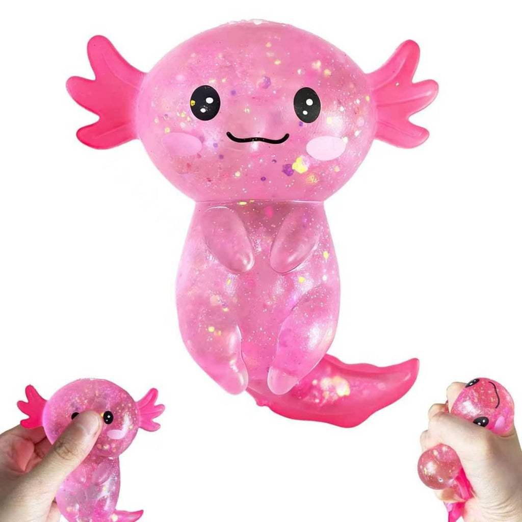 Pink glitter axolotl squish toy with smiling face, squishy body and side fins